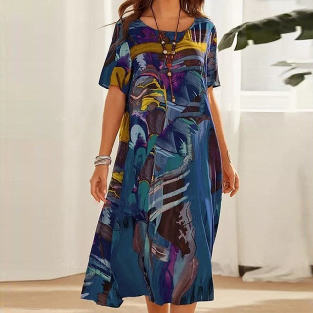Robe midi trapèze fluide pour femme, imprimée. Parfaite pour un look bohème décontracté et confortable.