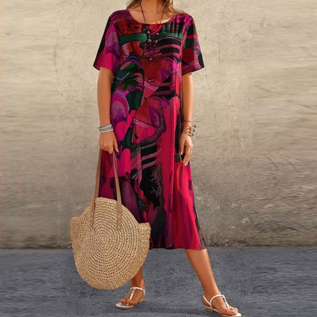 Tenue femme décontractée: robe midi imprimée trapèze fluide, douce et confortable. Style bohème facile à porter.