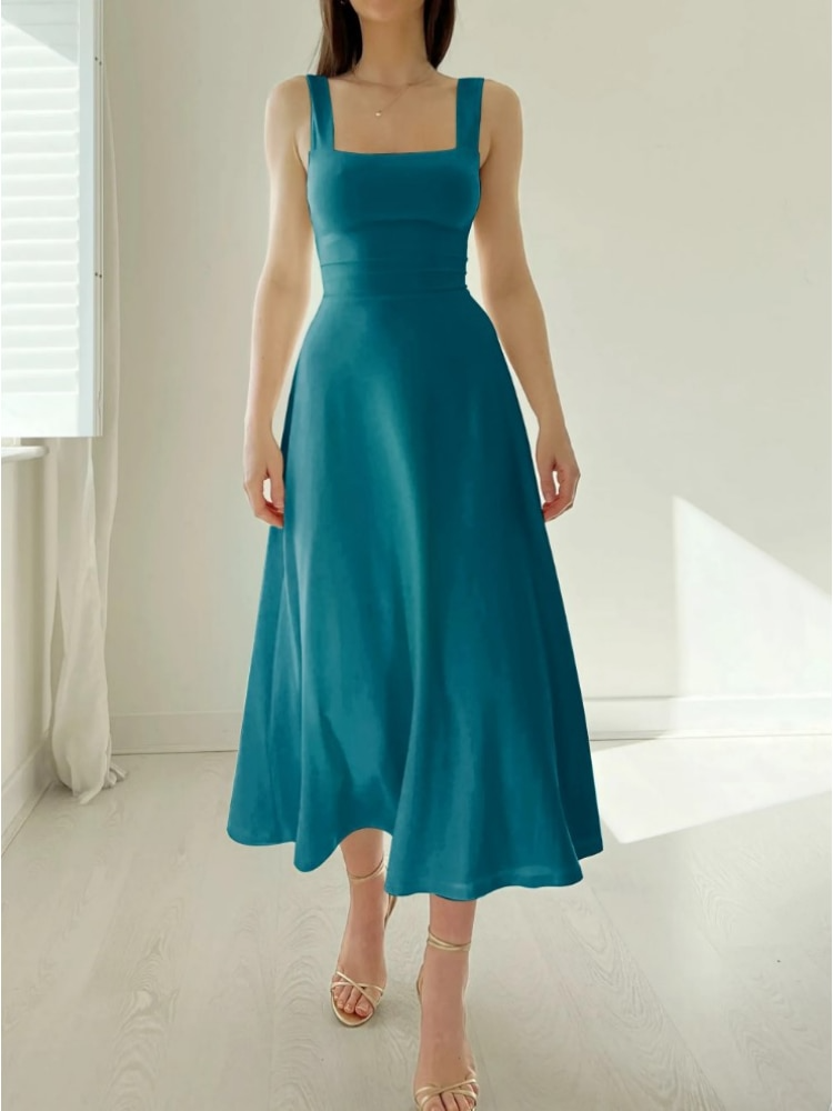 Robe femme midi trapèze polyvalente, sans manches, pour look décontracté ou habillé.