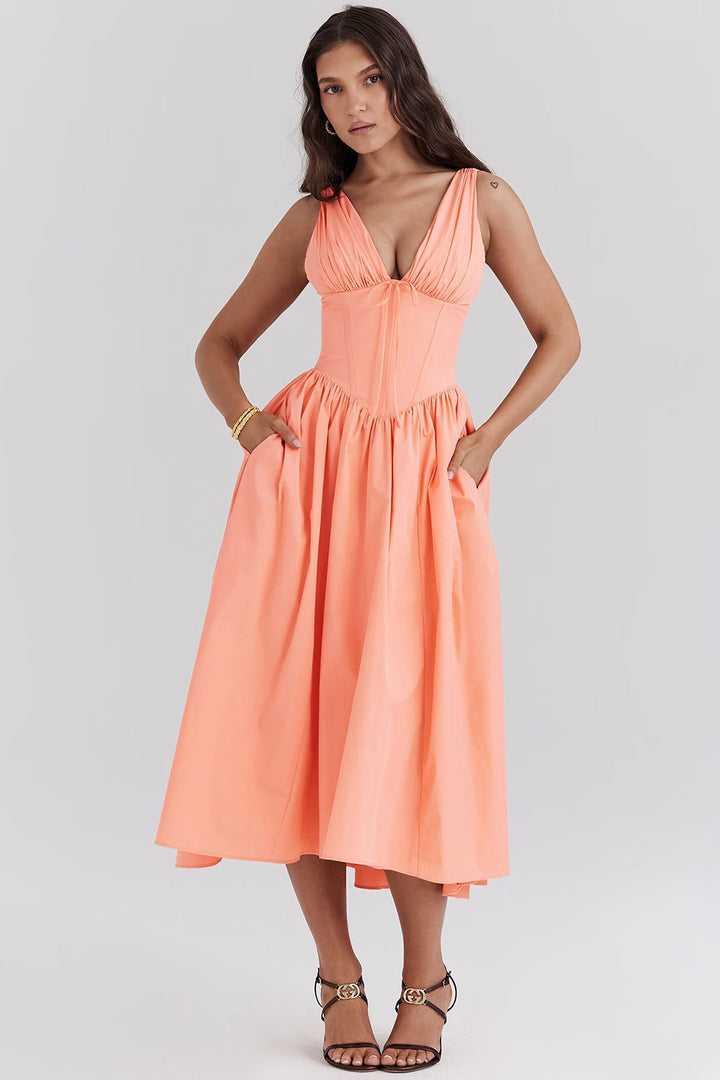 Élégante robe midi fleurie pour femme, sans manches, coupe trapèze avec poches, idéale été.