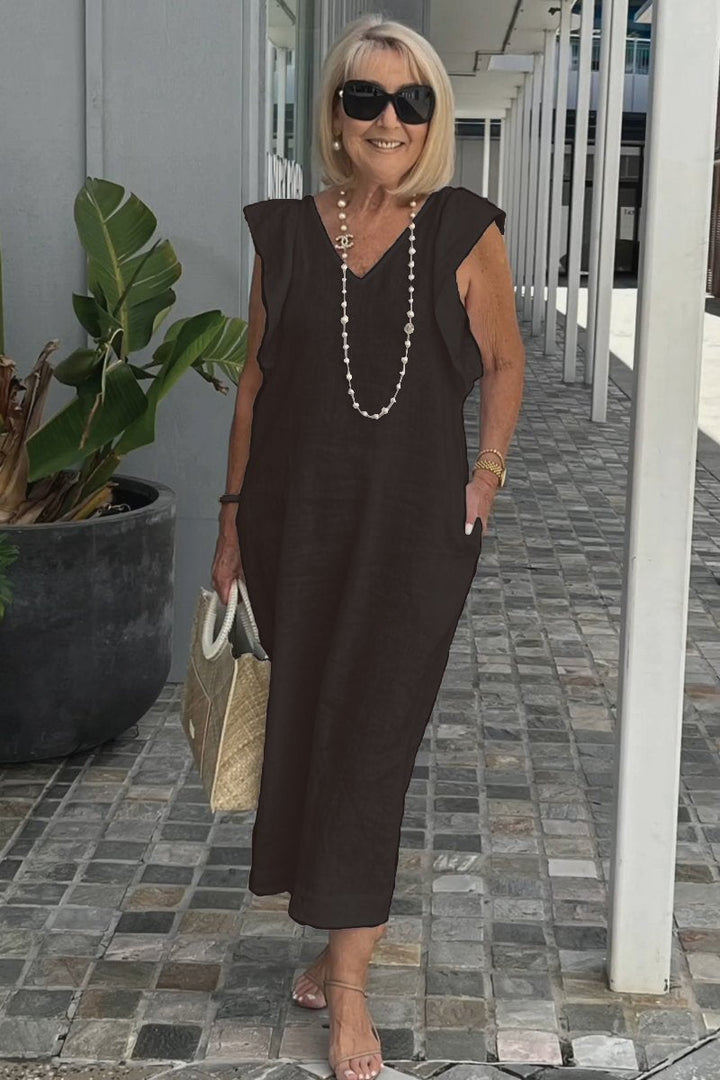 Robe midi décontractée sans manches à col en V pour femme, mode été élégante et polyvalente.
