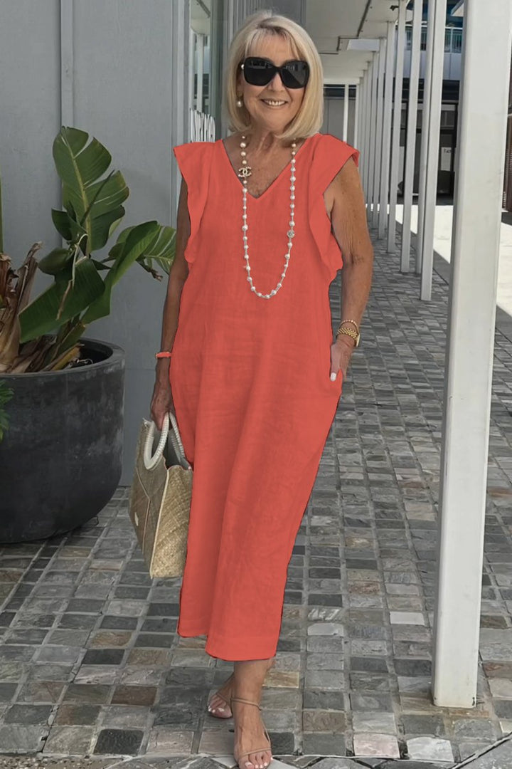 Robe midi fluide sans manches pour femme, chic et décontractée, parfaite pour une allure élégante en été.