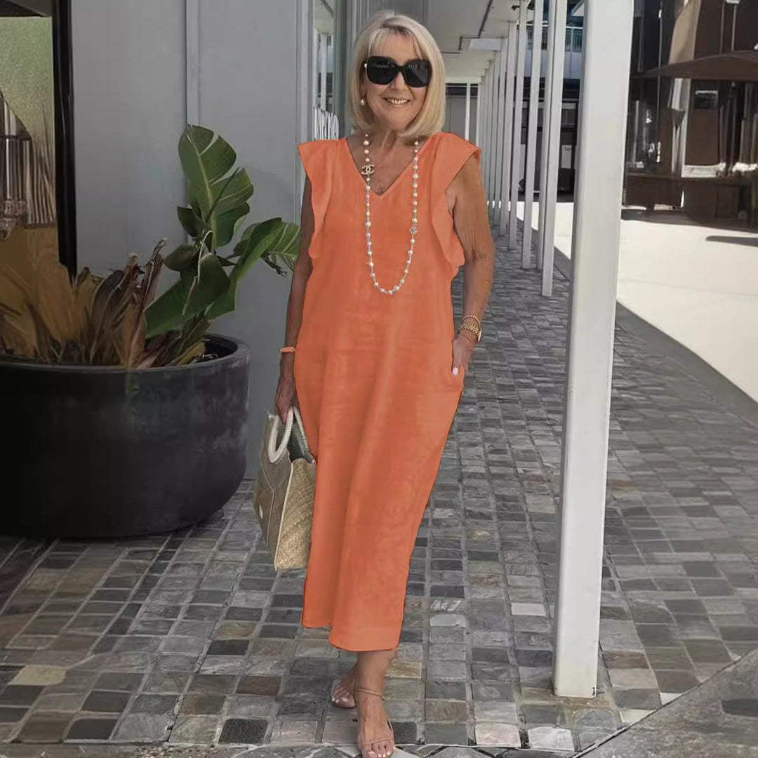 Robe d'été décontractée-chic sans manches à col en V pour femme, idéale pour les sorties estivales.