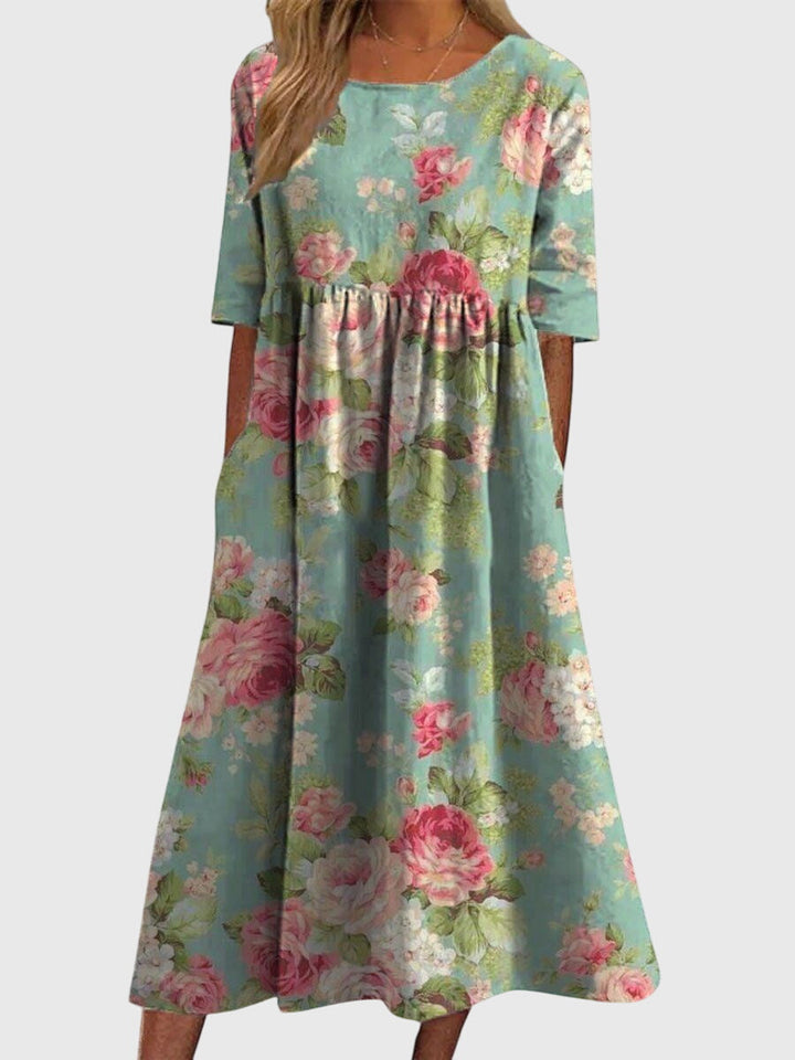 Robe midi fluide et polyvalente pour femme, idéale pour un look décontracté ou habillé, printemps/été.