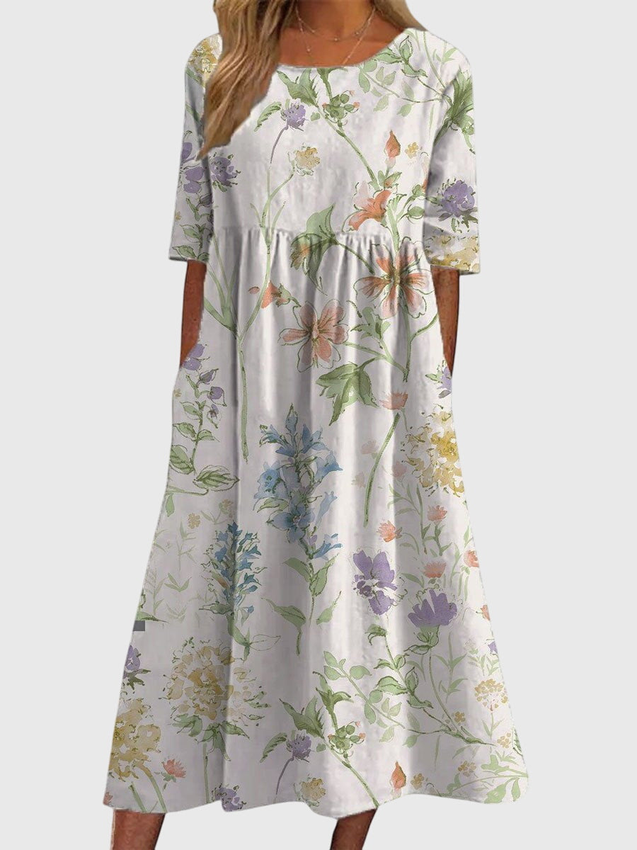 Robe fluide midi femme avec broderie, style élégant chic, confortable pour le quotidien et l'été.