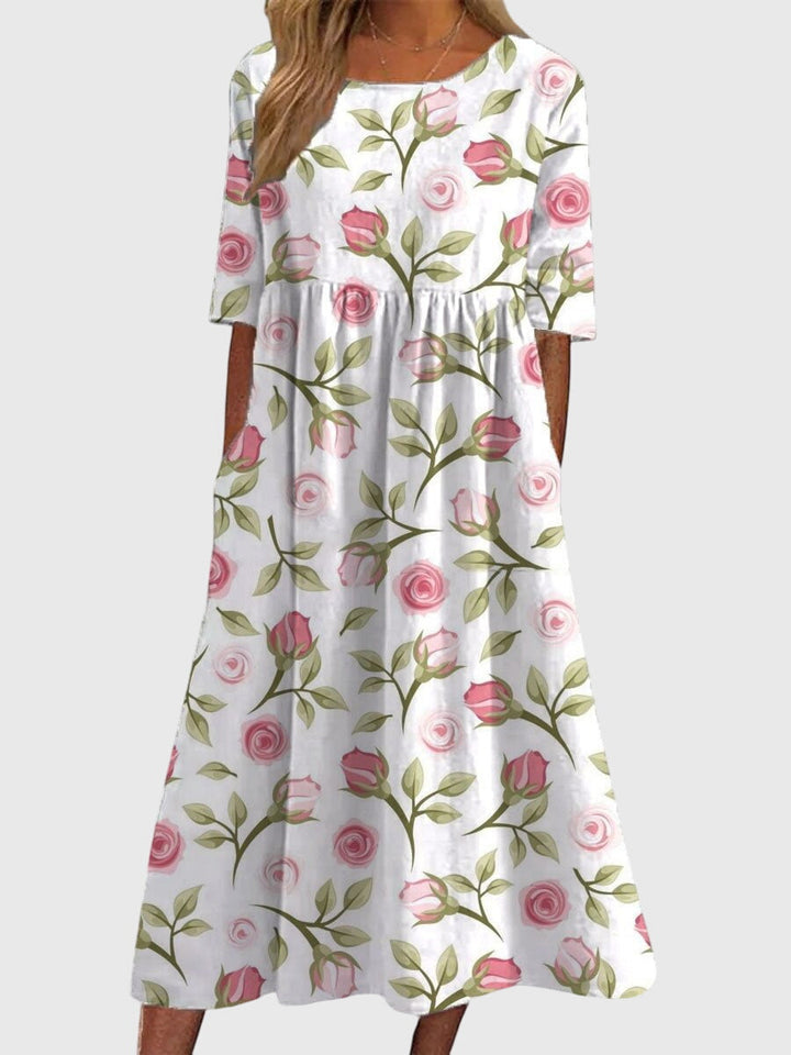 Robe midi fluide femme, broderie élégante, chic et confortable, idéale pour le quotidien et l'été.