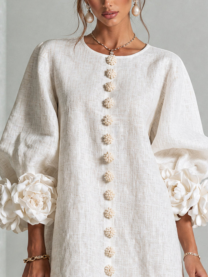 Robe trapèze rose d'été, boutonnée, effet lin, manches 3/4, pour une allure féminine et légère.