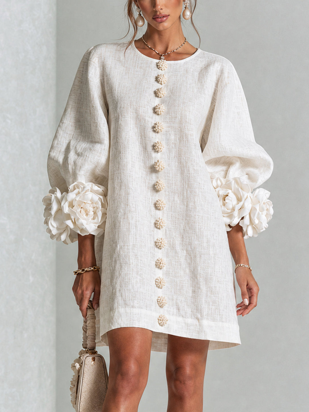 Robe boutonnée rose femme coupe trapèze, manches trois-quarts, tissu effet lin décontracté.