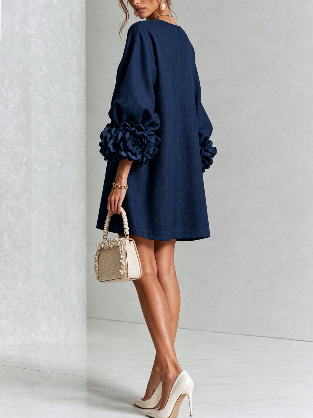 Robe femme rose fluide, effet lin, manches 3/4, boutonnée, coupe trapèze, chic et estivale.