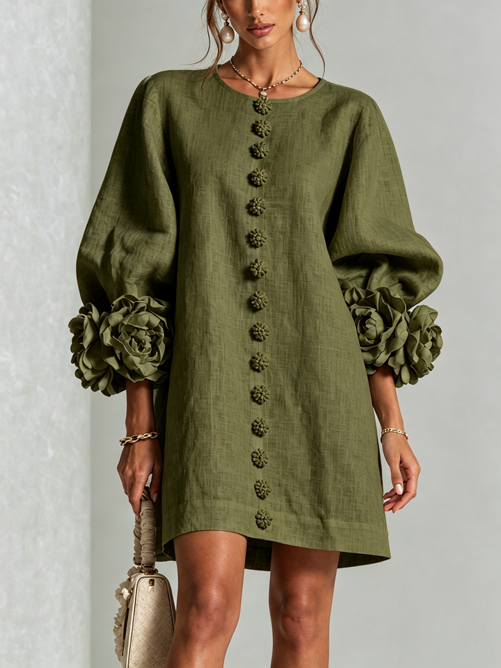 Élégante robe d'été rose fluide pour femme, manches 3/4, style trapèze décontracté chic.