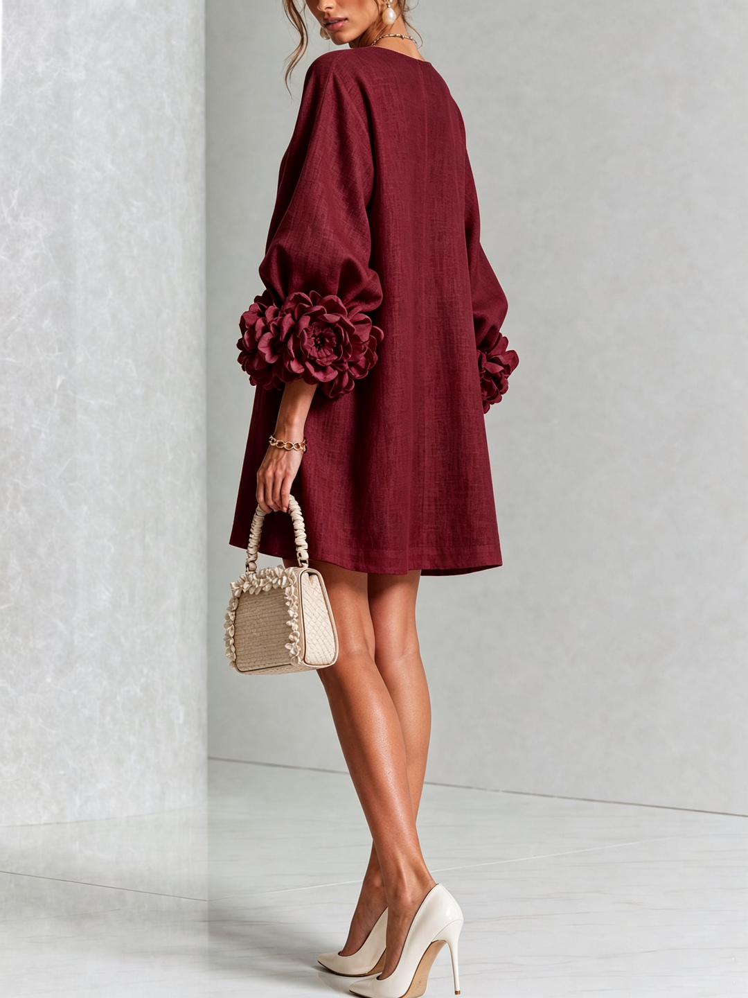 Robe rose fluide, manches trois-quarts, effet lin, coupe trapèze, parfaite pour l'été.