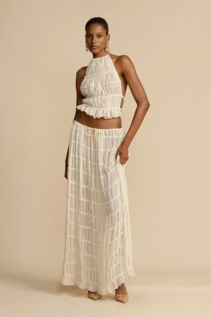 Ensemble femme Calysta en chiffon élégant, dos nu et plissé, parfait pour l'été et les soirées chic.