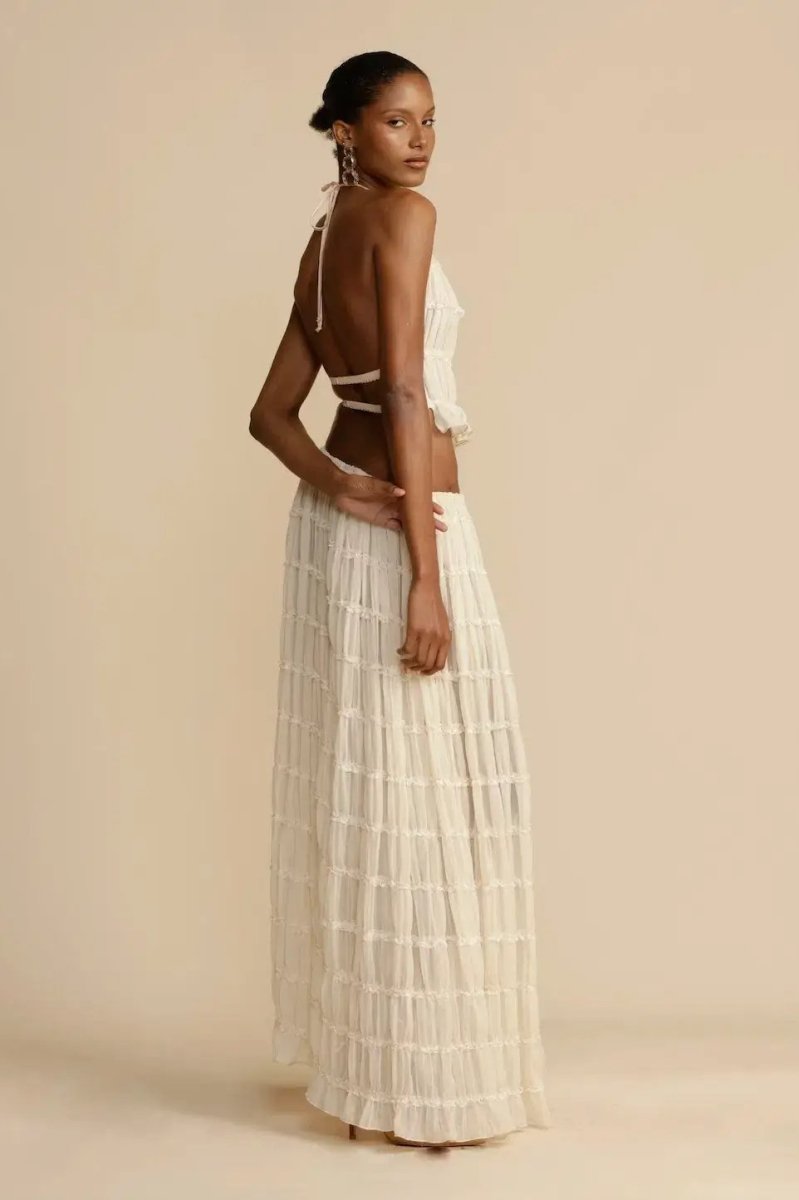 Ensemble deux pièces femme en chiffon Calysta, dos nu et jupe plissée, élégant et très confortable.