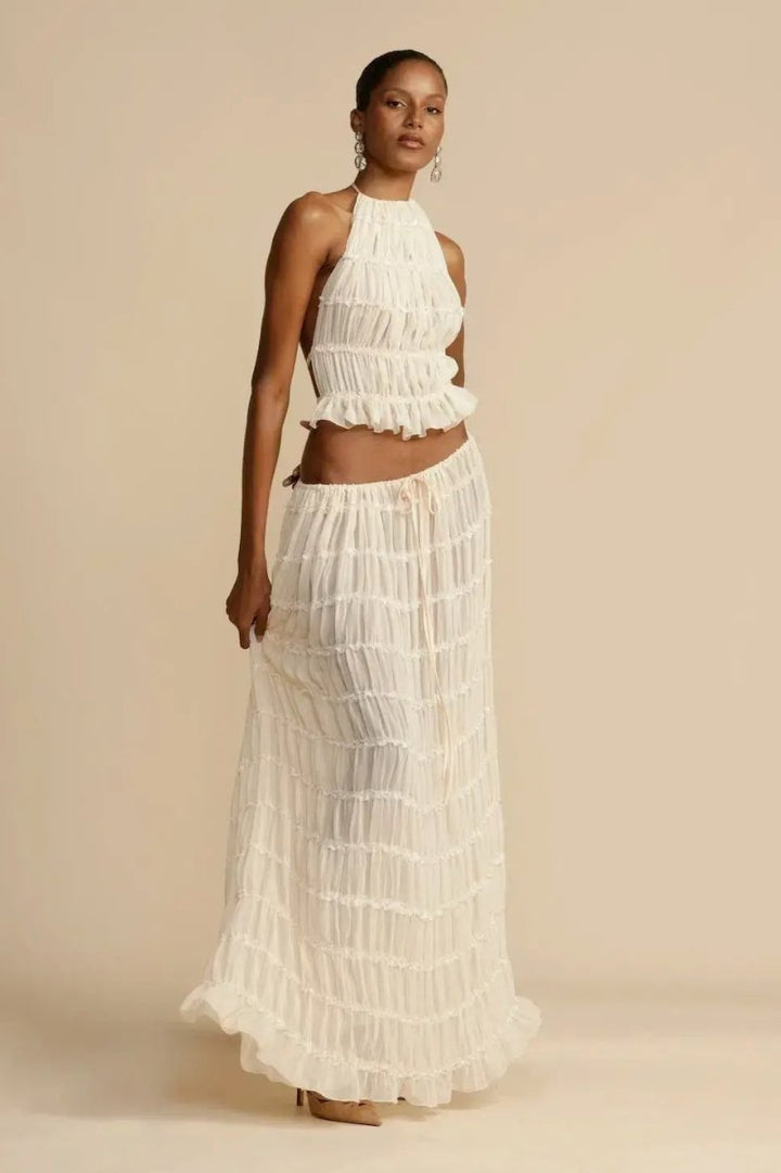 Ensemble femme élégant Calysta, tenue d'été idéale en chiffon dos nu plissé, pour cocktails et événements.