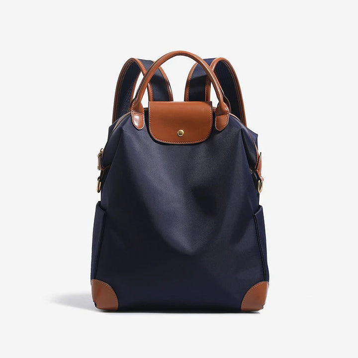 Sac à dos élégant en cuir pour femme, parfait pour transporter vos essentiels avec style et confort.