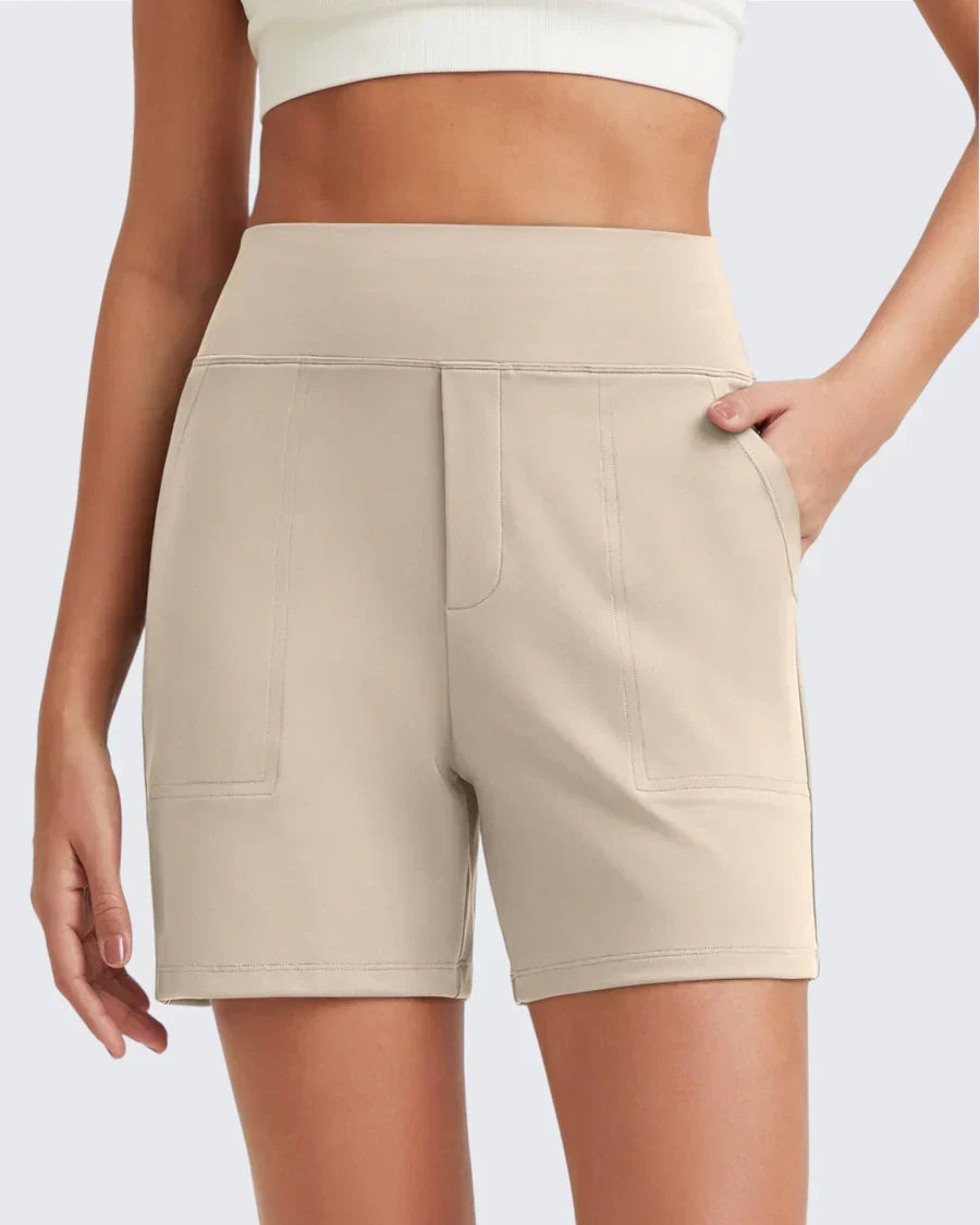 Short taille haute pour femme avec poches profondes, idéal printemps/été, style décontracté chic.