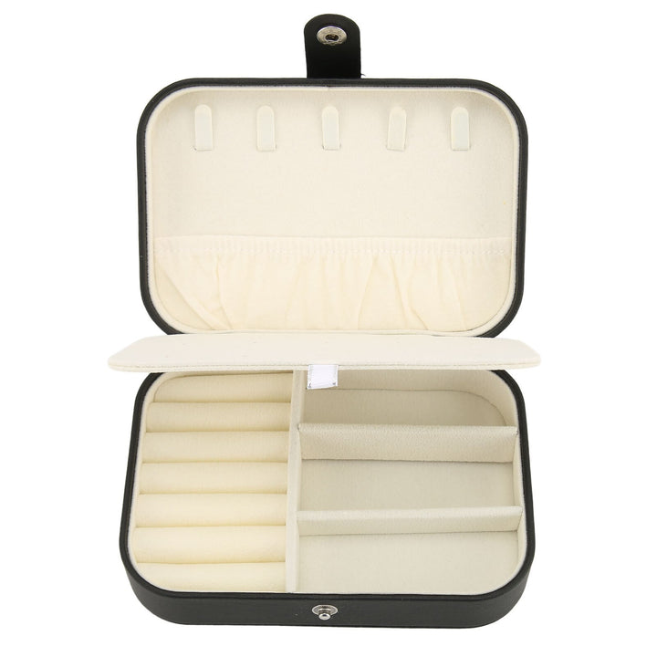 Boîte à bijoux portable en cuir rose, double couche, pour un rangement chic et sécurisé de vos joyaux.