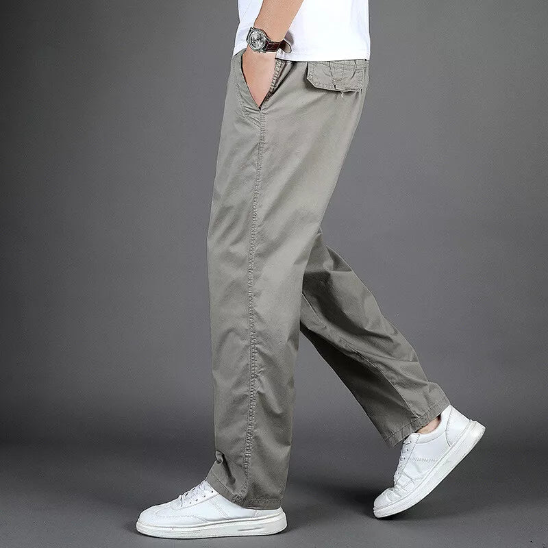 Pantalon oversize homme décontracté en lin avec poches zippées, idéal pour un style urbain confortable.