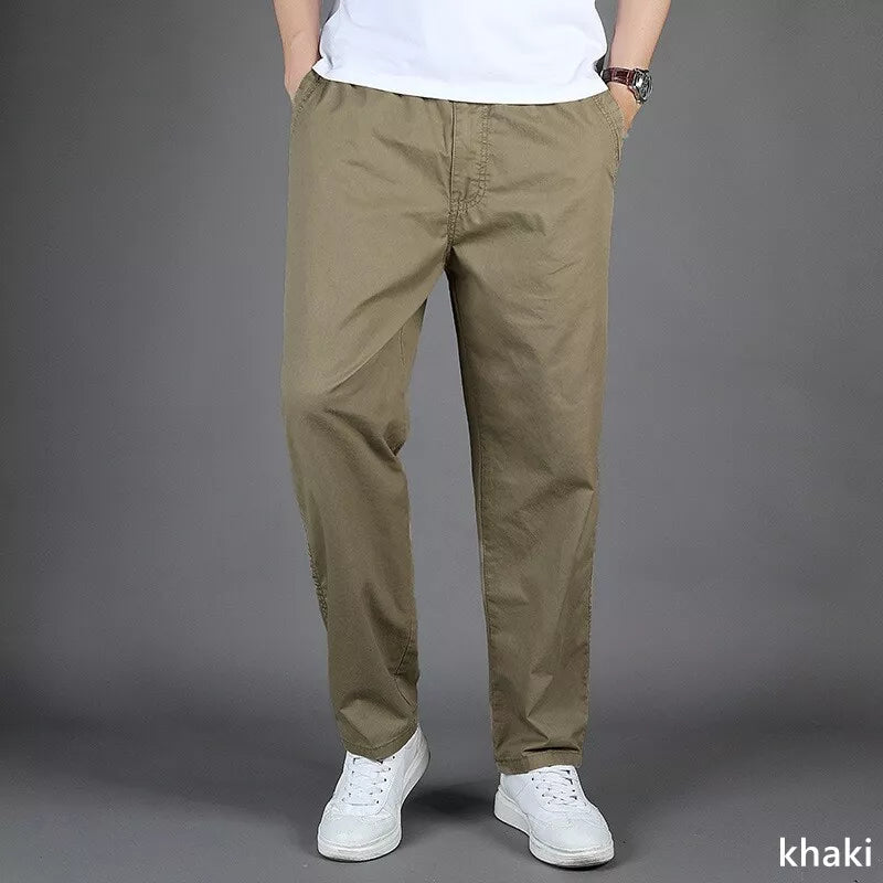 Basique pantalon homme oversize en lin, décontracté avec poches zippées, confortable pour l'été.