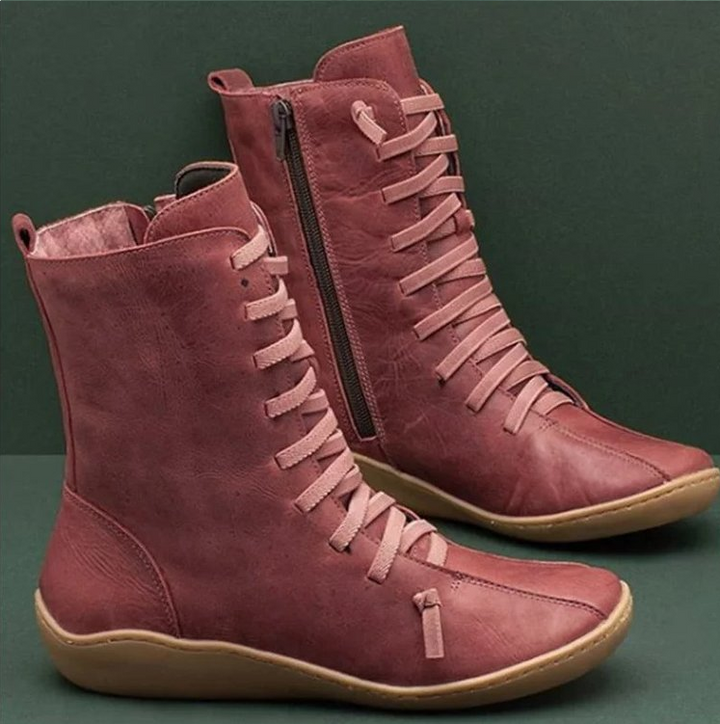 Bottes femme élégantes et confortables pour automne/hiver. Bottines artisanales en cuir, semelle souple antidérapante.