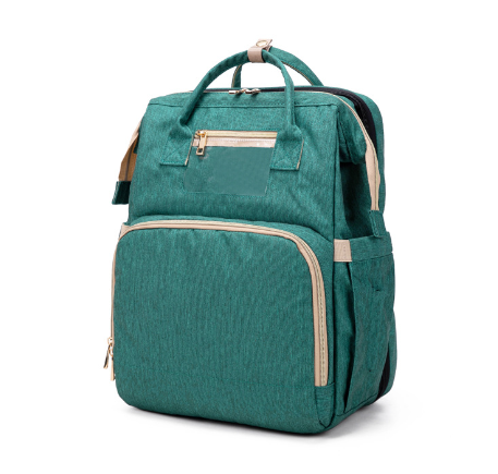 Sac à dos à langer multifonctionnel avec lit bébé pliable intégré, idéal pour le change et la sieste nomade.