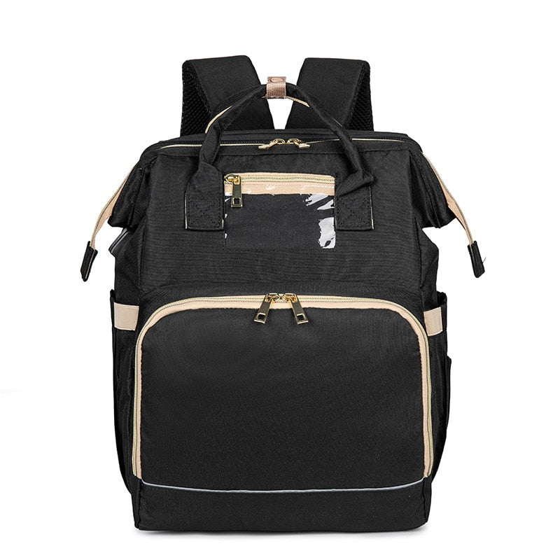 Sac de voyage bébé imperméable, sac à dos à langer avec lit pliable pour des déplacements faciles et organisés.