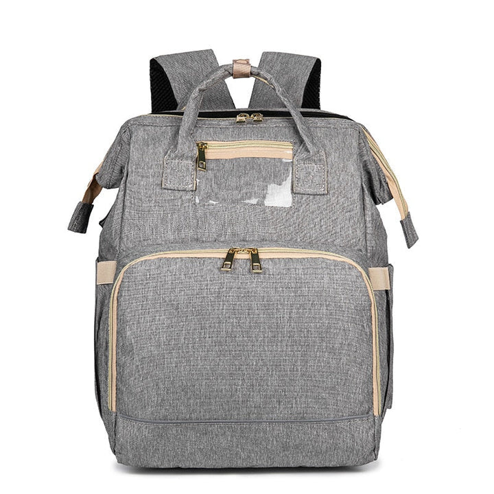 Sac à langer pour poussette, sac à dos maman/papa avec lit bébé intégré, essentiel pour l'organisation et le change.