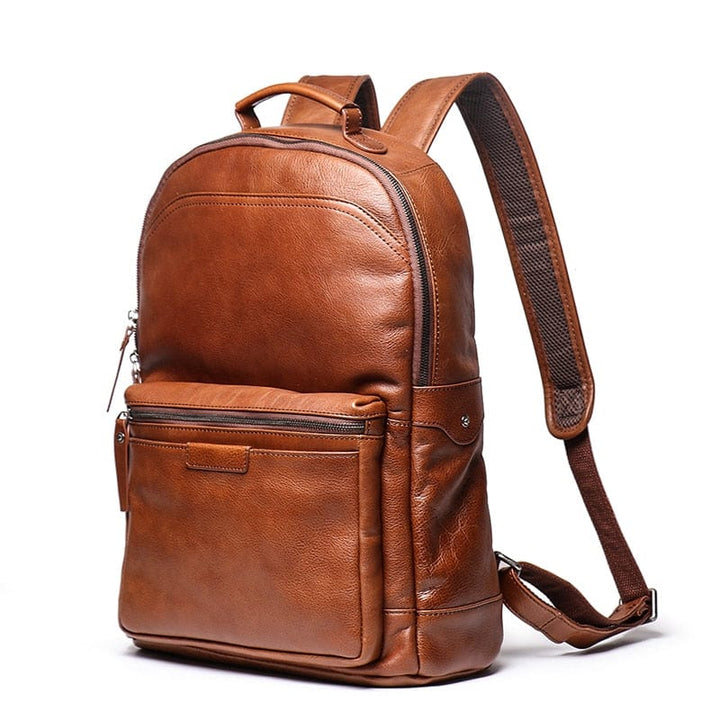 Sac à dos polyvalent en cuir véritable, pour homme, allie élégance et fonctionnalité.