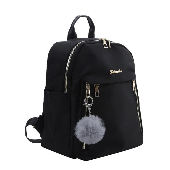 Sac à dos femme urbain noir, pratique et élégant, idéal pour le travail ou les sorties quotidiennes.