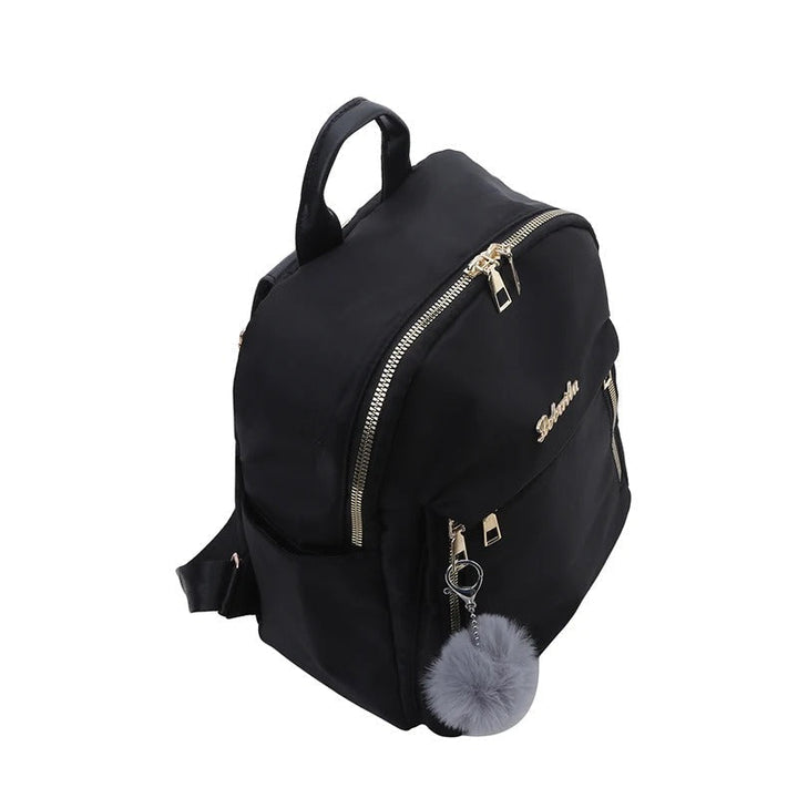 Sac à dos femme noir avec organisateur, élégant et pratique pour vos essentiels quotidiens et voyage.