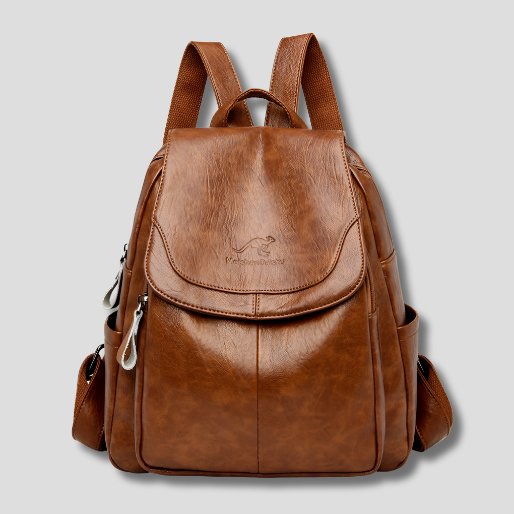 Pratique sac à dos en cuir véritable pour femme, détails gaufrés. Idéal pour organiser vos affaires en ville.
