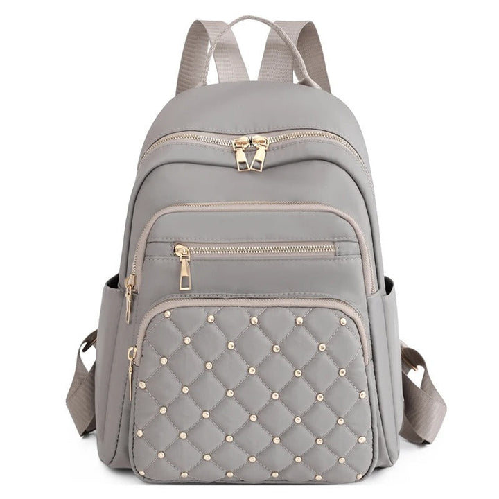 Sac à dos école femme léger et imperméable en nylon, parfait pour les livres, études et quotidien.