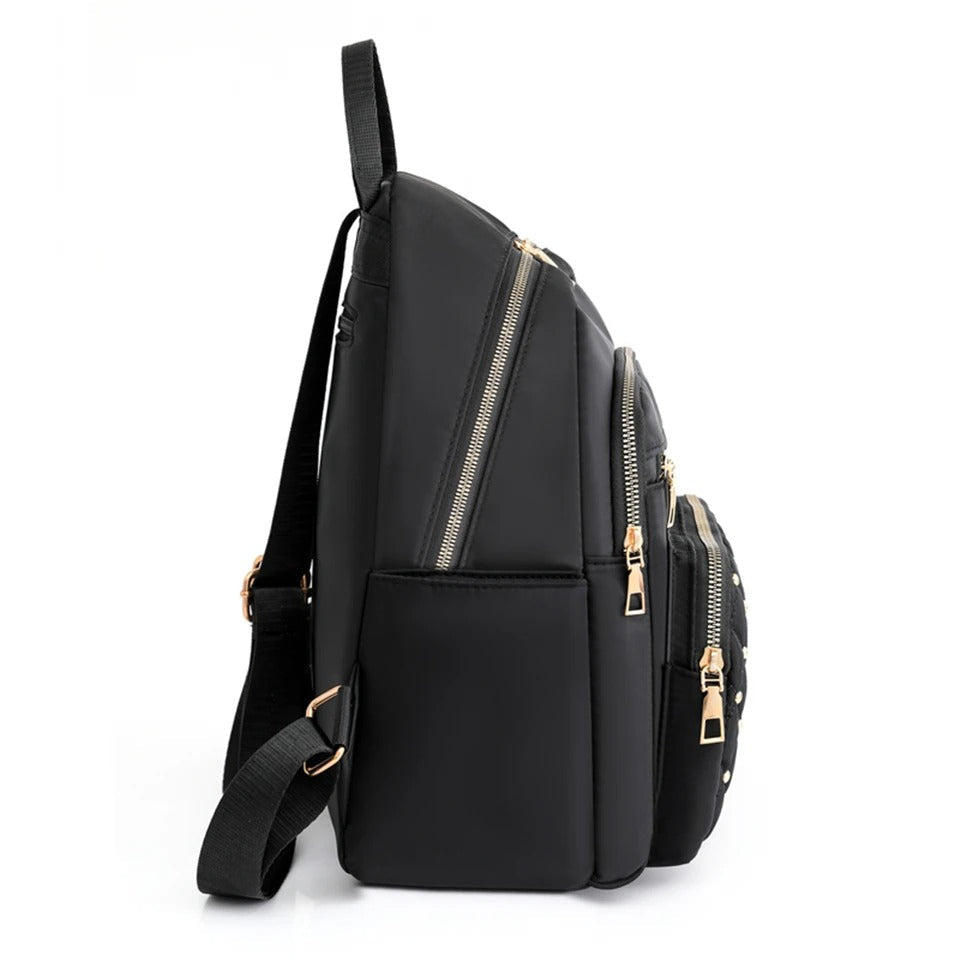 Sac à dos femme élégant, imperméable et léger, parfait pour les voyages, études ou usage quotidien.