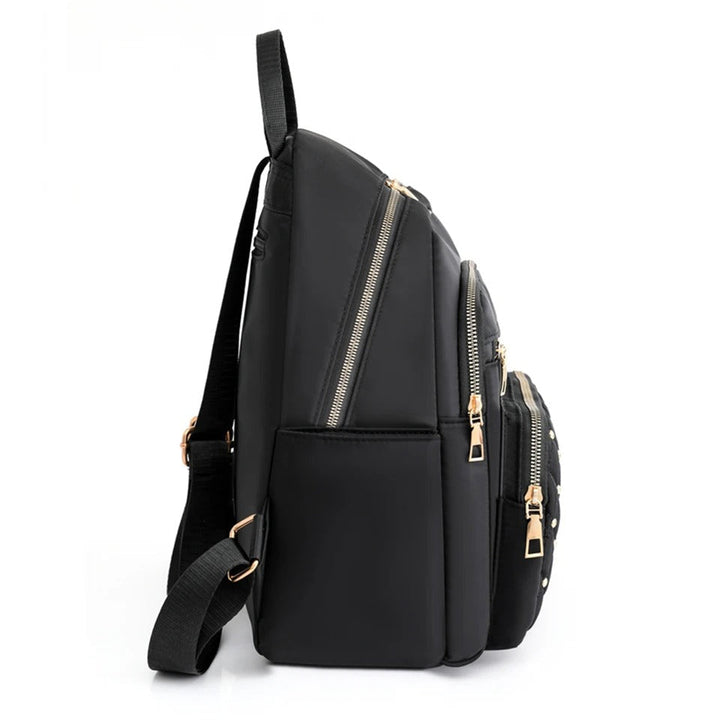 Sac à dos femme élégant, imperméable et léger, parfait pour les voyages, études ou usage quotidien.