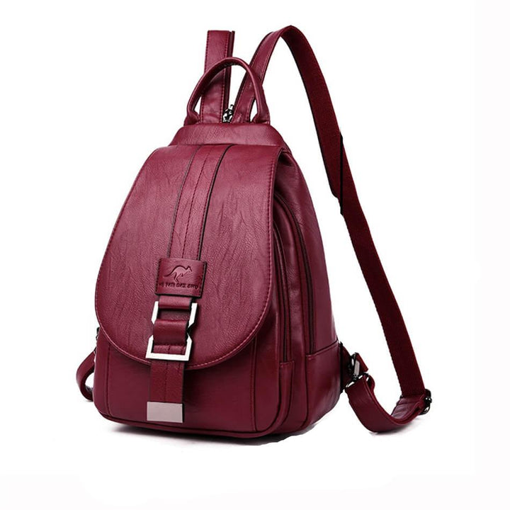 Sac à dos rouge pour femmes, accessoire mode éclatant et pratique, parfait pour l'élégance quotidienne.