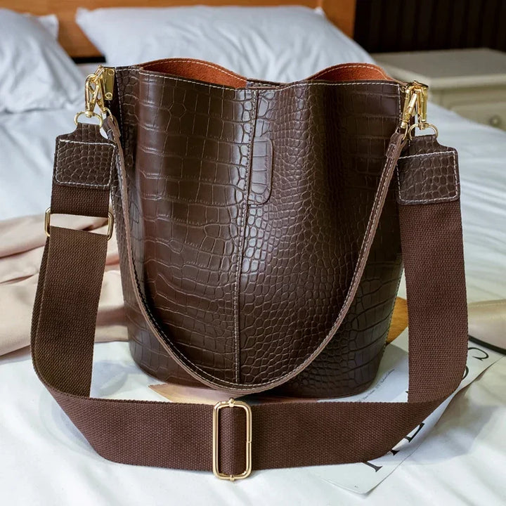 Sac à main femme polyvalent en cuir vegan, avec bandoulière ajustable, idéal pour un style élégant.