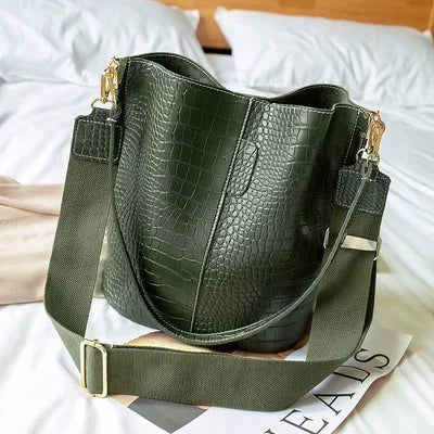 Sac à main femme, bandoulière ajustable, en cuir vegan, élégant et pratique pour un look quotidien raffiné.