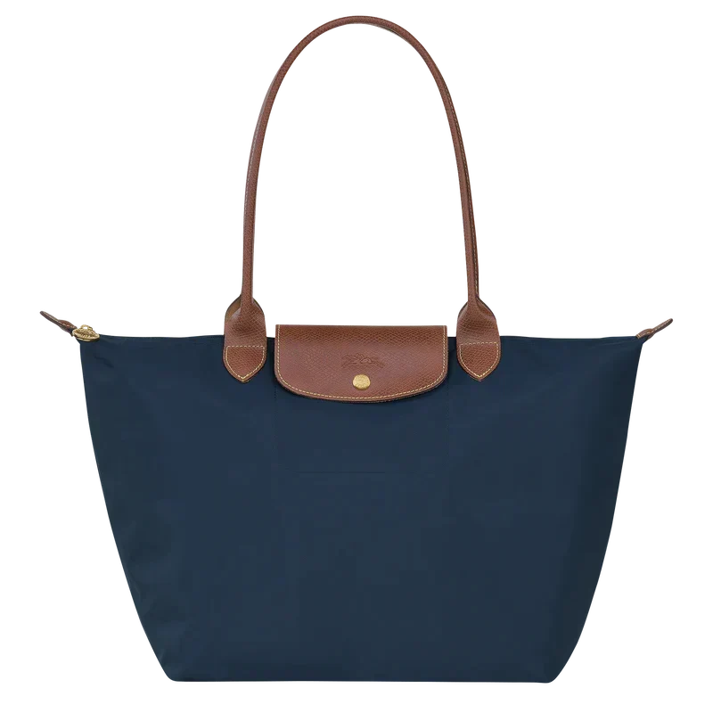 Sac shopping bleu foncé, grand et pliable. Idéal pour le marché ou comme sac d'appoint de voyage pratique.