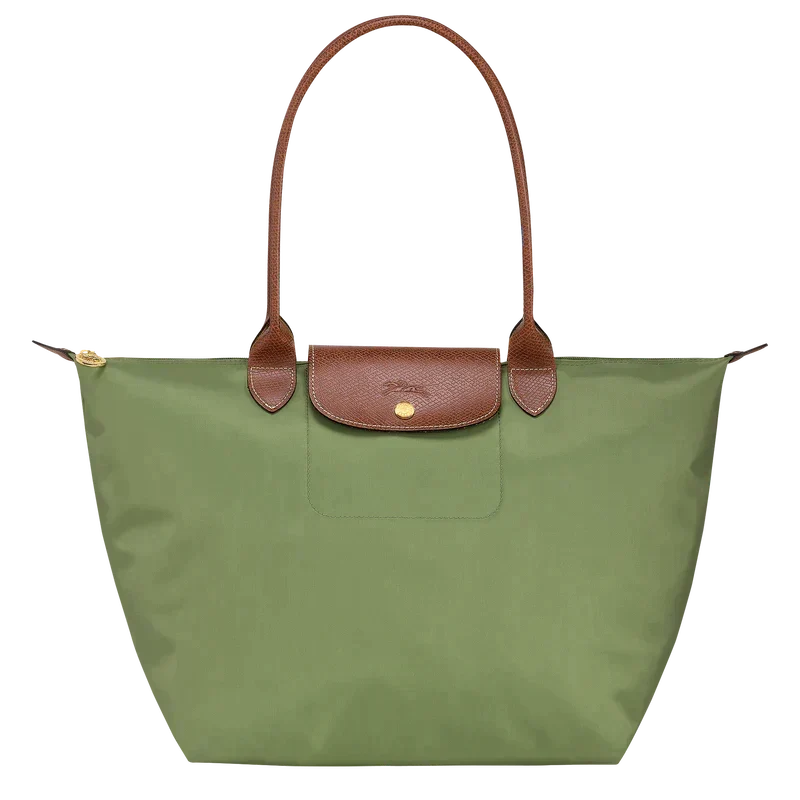Accessoire femme lilas, sac à main pliable et léger. Parfait pour le voyage ou comme sac d'appoint chic.