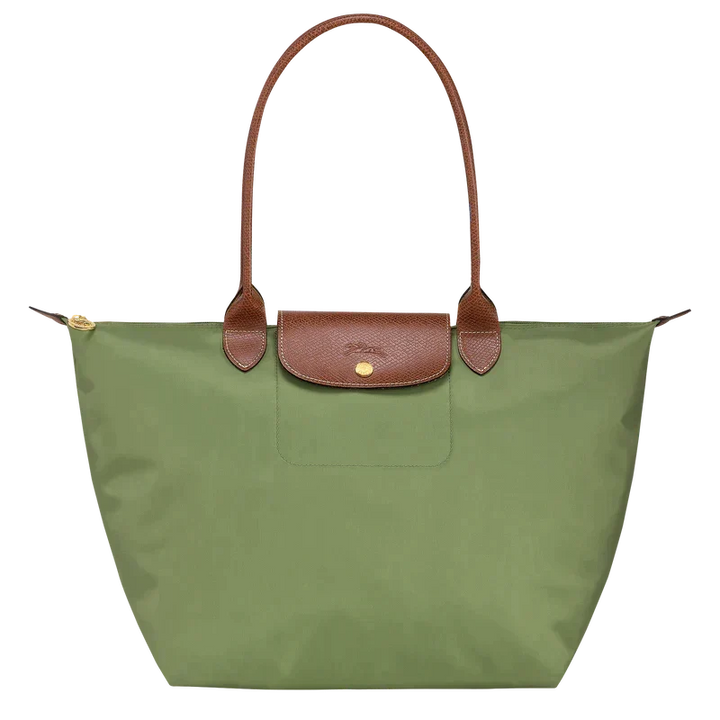 Accessoire femme lilas, sac à main pliable et léger. Parfait pour le voyage ou comme sac d'appoint chic.
