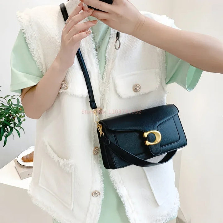 Sac à main femme spacieux, design chic et élégant, parfait pour transporter tous vos essentiels. Grande contenance.