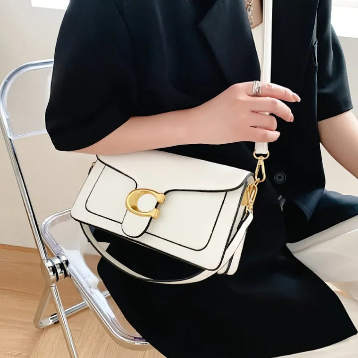 Sac à main élégant pour femme avec organisation intelligente, accessoire de mode polyvalent et chic.