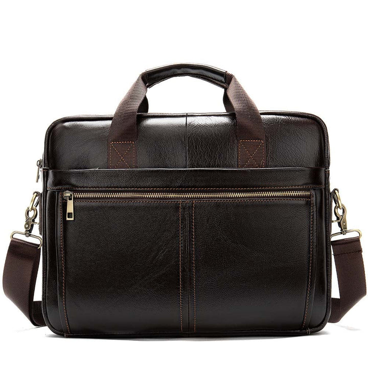 Sac à main homme élégant en cuir vegan posé sur un bureau, accessoire pro et moderne pour l'homme urbain.