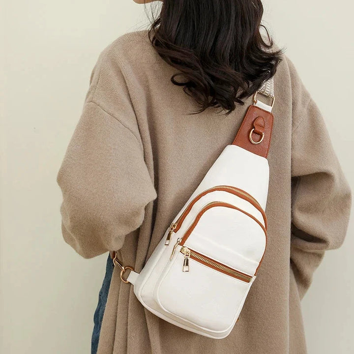 Sac poitrine femme en cuir PU, design élégant. Pratique pour le sport ou les sorties loisir.
