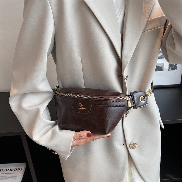 Sac banane femme, accessoire essentiel en cuir PU pour un style chic et pratique au quotidien.