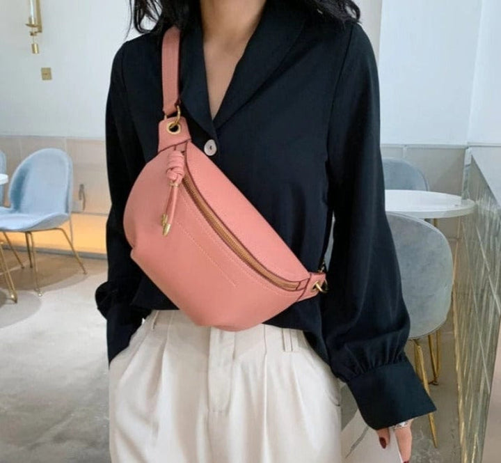Sac banane noir en cuir PU pour femme, chic et tendance, idéal en bandoulière.