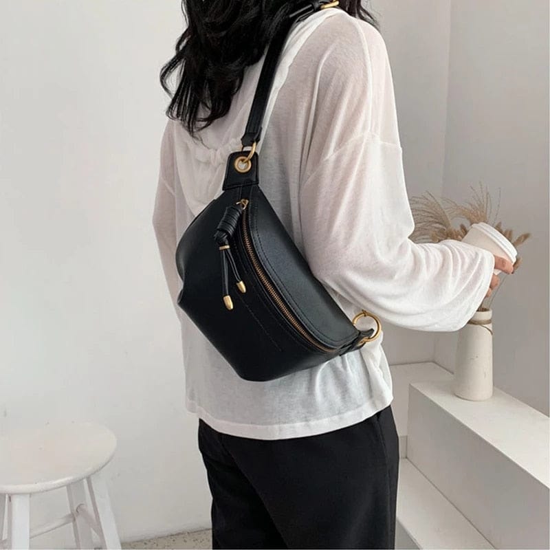 Sac banane en cuir PU noir, un accessoire chic et versatile pour la femme moderne.