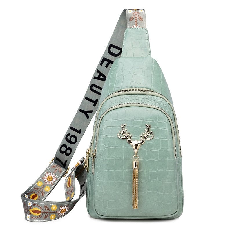 Sac banane blanc pur femme, en cuir vegan. Idéal pour un look estival, pratique et tendance à porter en bandoulière.