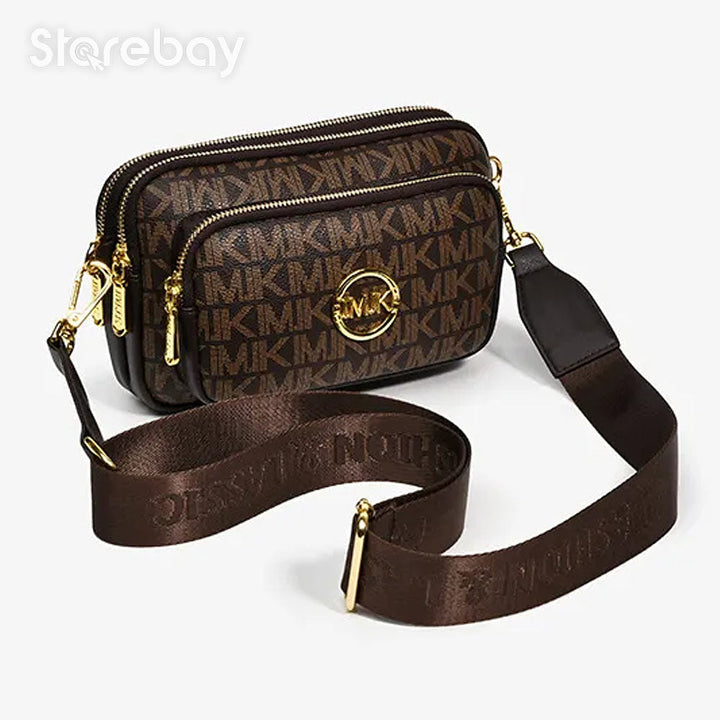 Sac femme compact et chic à bandoulière, design monogramme marron, accessoire mode parfait pour le quotidien.