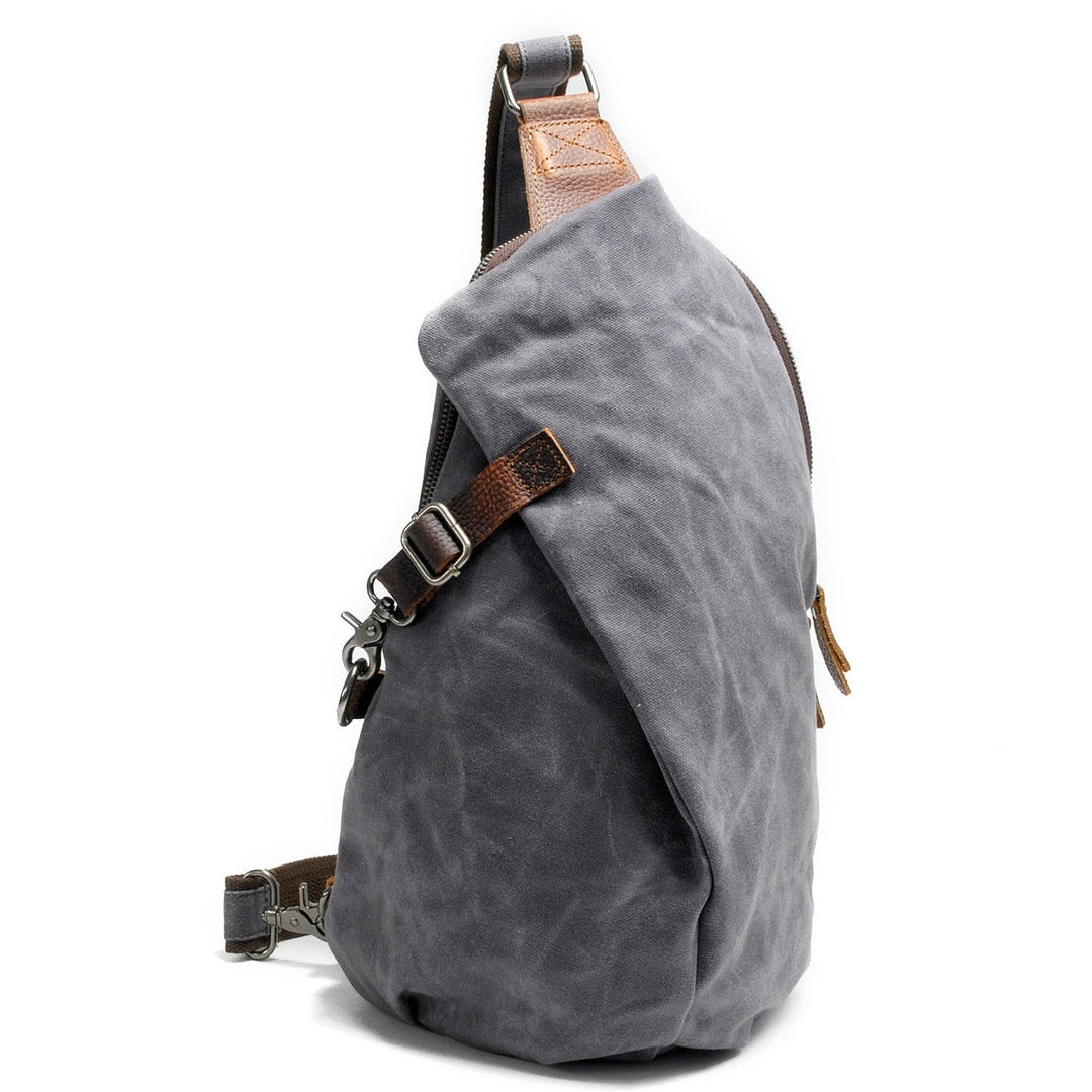 Sac poitrine homme gris, sécurisé et multi-porté, parfait pour le quotidien.